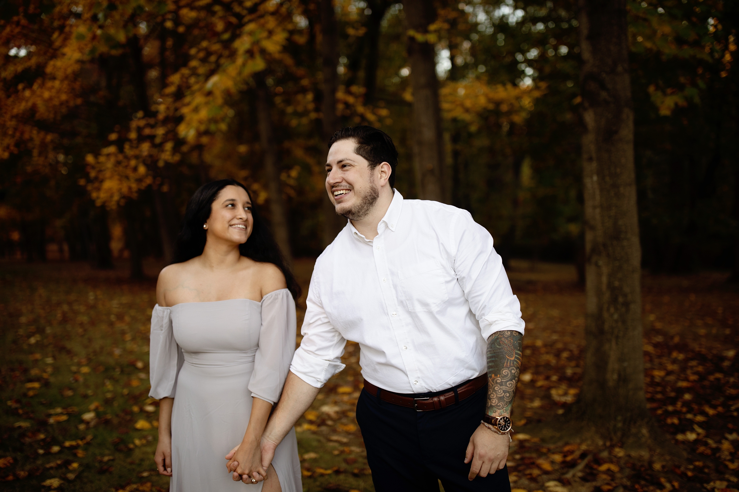 Engagement couple in the fall at Drumore Estate, Lancaster PA in a romantic off the shoulder lavender satin gown