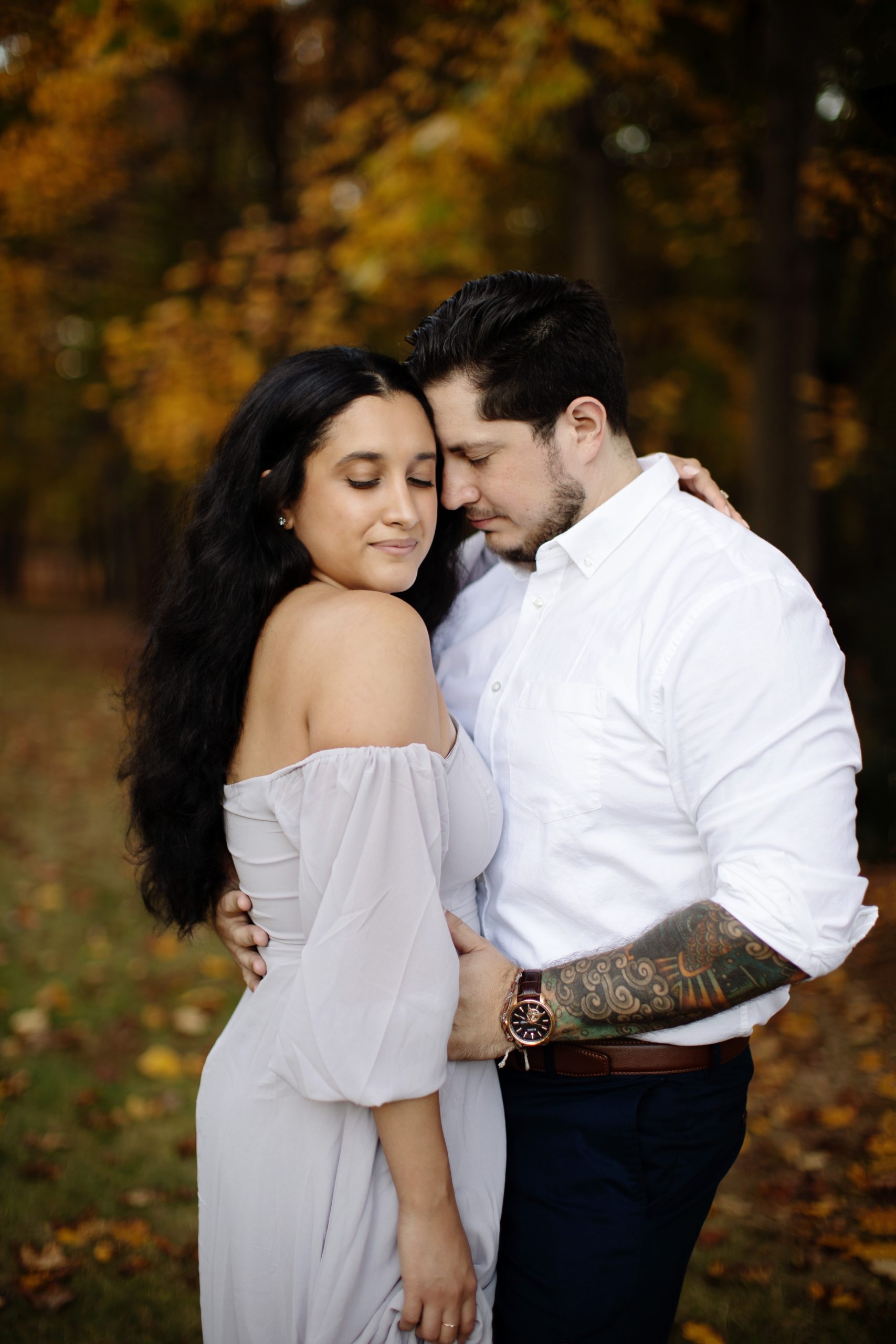 Engagement couple in the fall at Drumore Estate, Lancaster PA in a romantic off the shoulder lavender satin gown