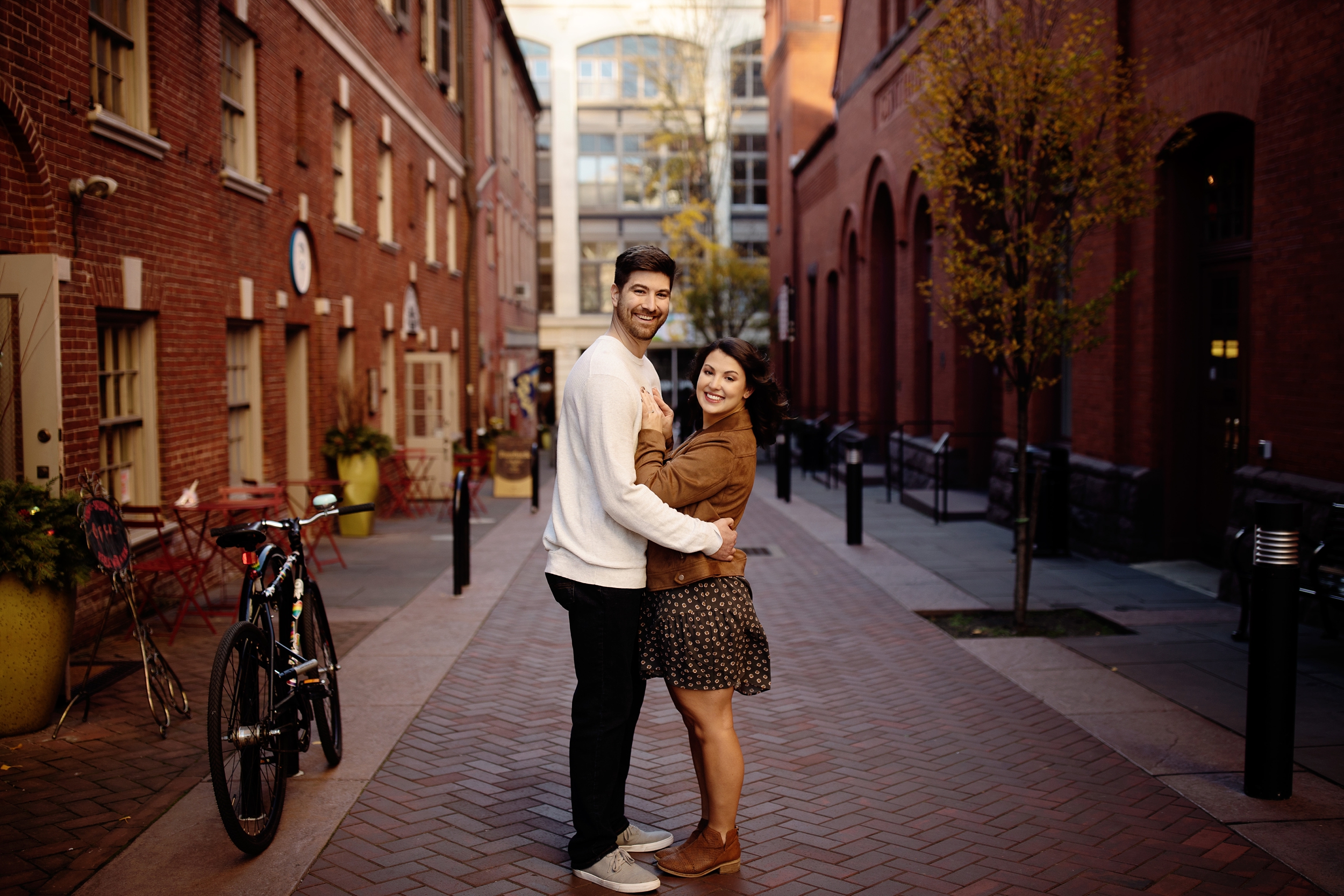 Lancaster City Fall Engagement Photos, Couple Strolls through Central Market and exploring the light and texture that Lancaster City, PA offers.