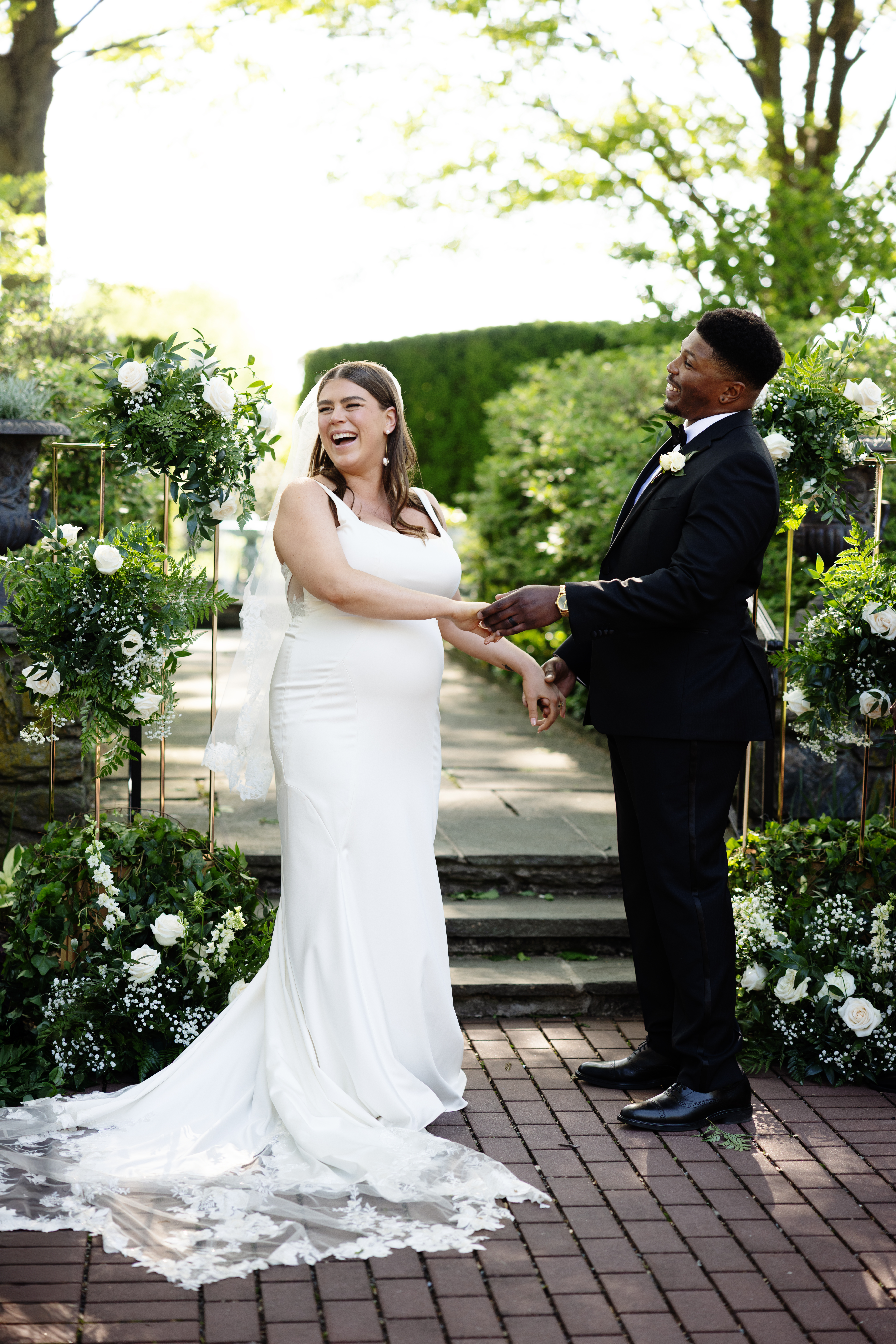 Bride and Groom laughing at their emotional garden wedding ceremony at Drumore Estate wedding in Lancaster, Pa